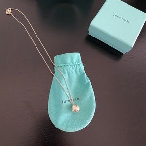 Tiffany & Co. adjustable 18” sterling silver ball pendant.